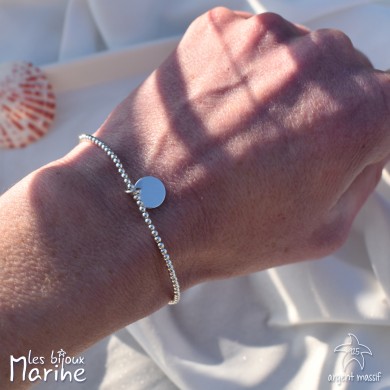 Bracelet élastique perle argent et sa médaille lisse